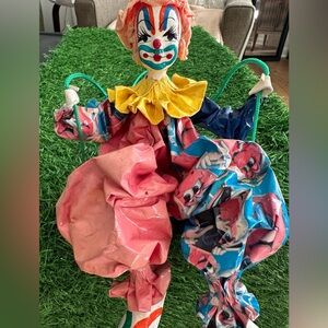 Vintage Paper Mache clown on a swing. Clown is 10” tall. From Mexico? Unique